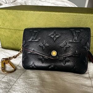 Victorine leather wallet in Louis Vuitton blue. LV Monogram Empreinte Leather